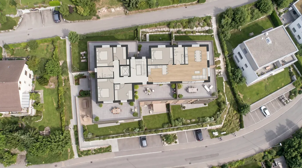 Grundriss eines Geschosses des Gebäudes mit Garten